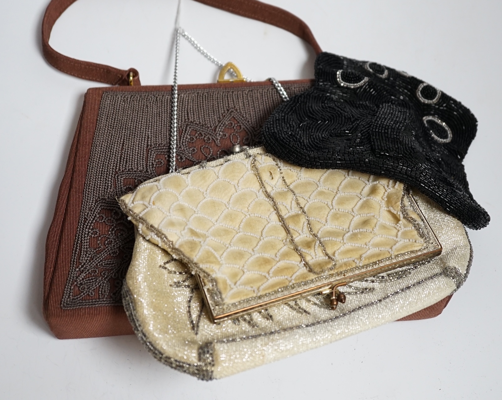 Three various Edwardian sequin and beadwork decorated evening bags and a corde work cocktail bag (4)
